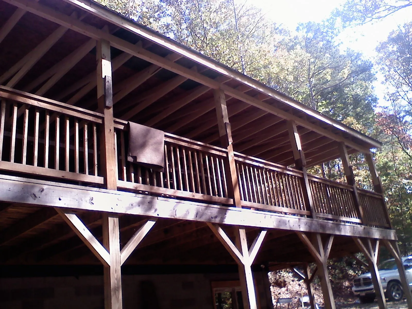 Timber framing under a new elevated porch and deck — Roof Leak Repair in Remsen by Roofing Brothers